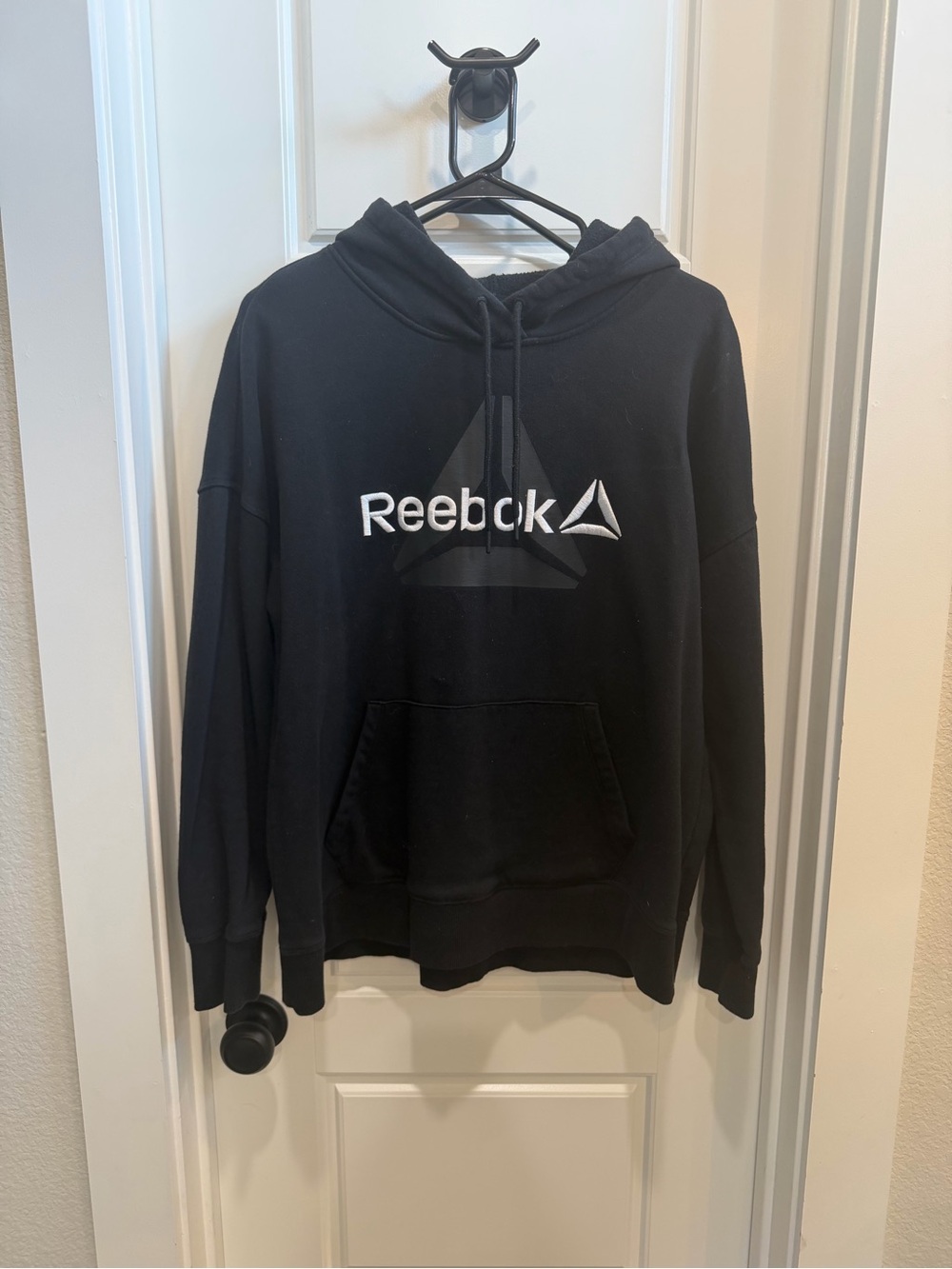 Reebok Black Logo Pullover Hoodie with White Embroidered Text